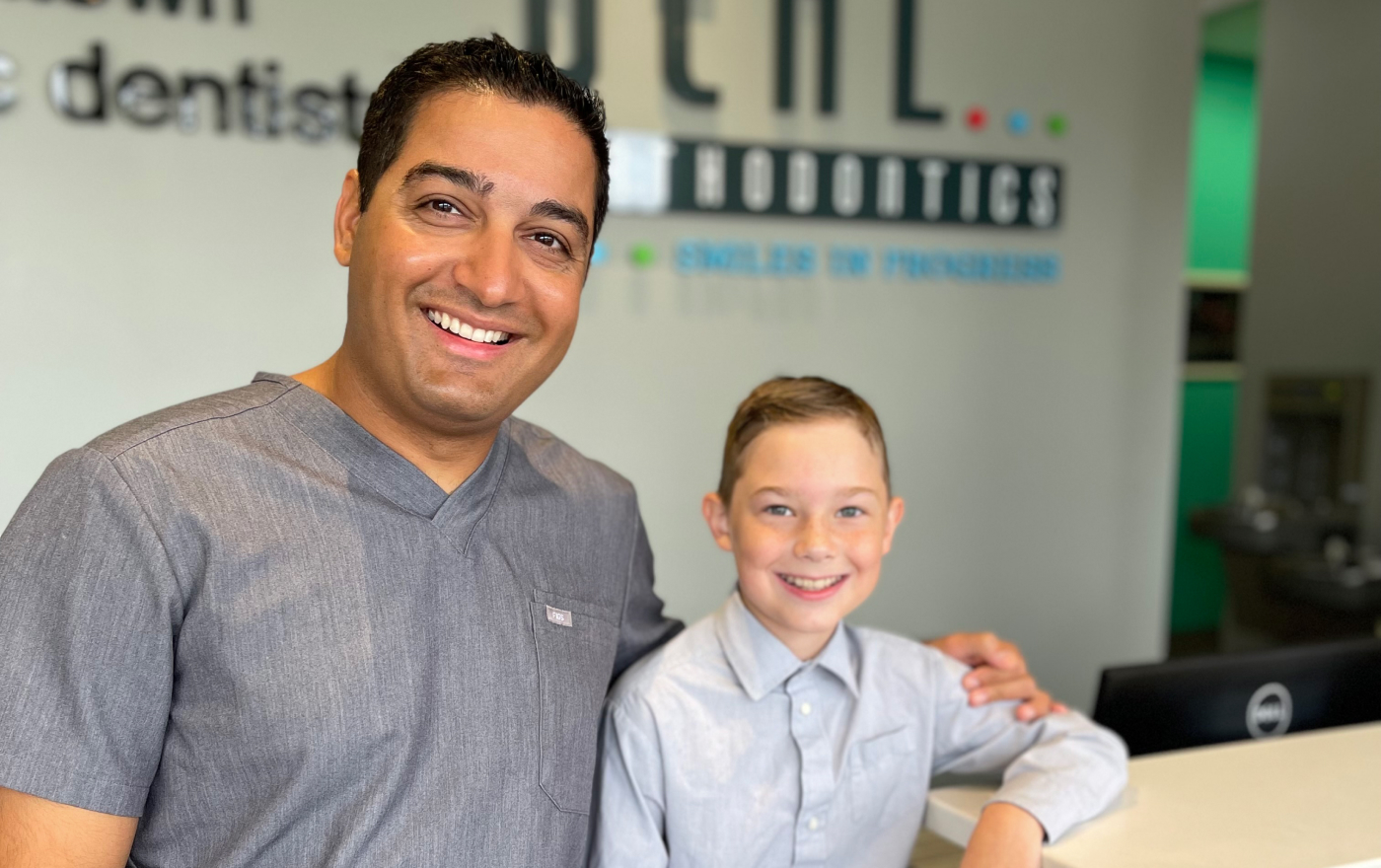 Dr. Behl with a happy patient at Behl Orthodontics